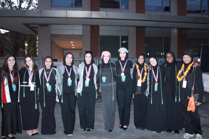 Girls with medals and trophy