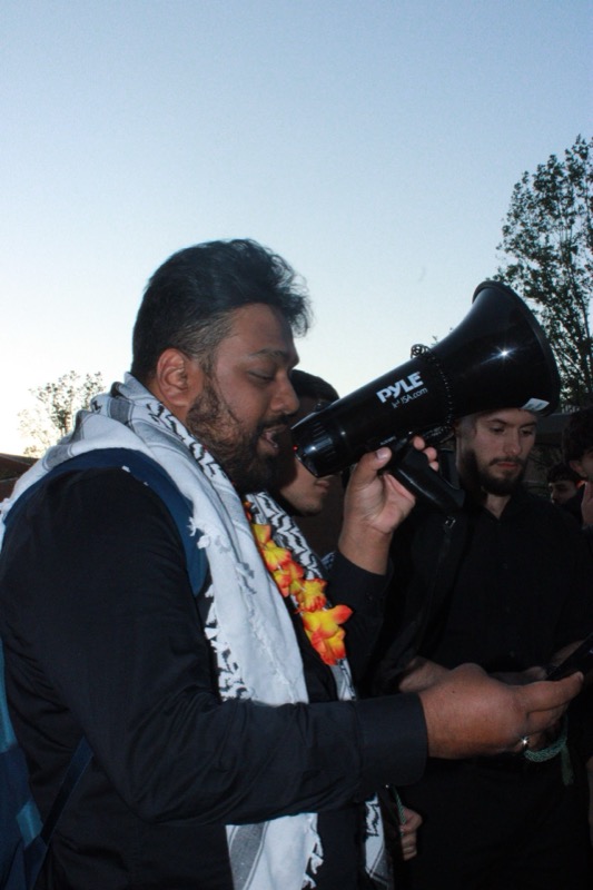 Coach rallying team with megaphone